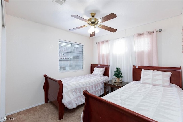 bedroom with carpet flooring and ceiling fan