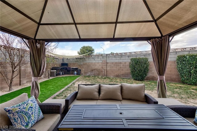 view of patio with a gazebo and outdoor lounge area