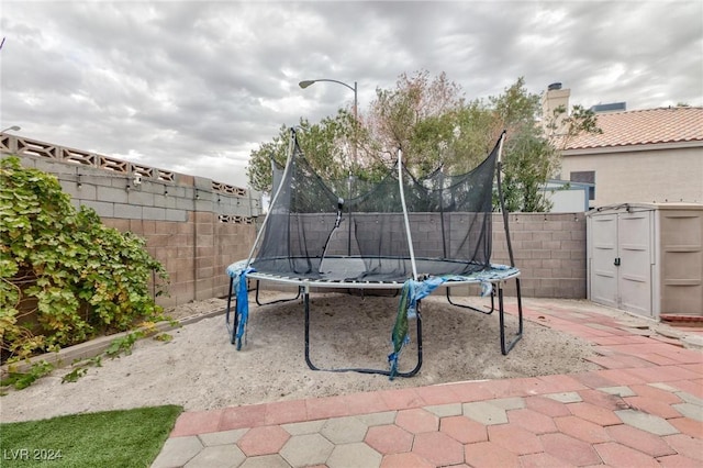 view of playground featuring a trampoline