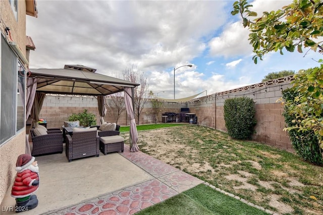 view of yard featuring a gazebo and outdoor lounge area