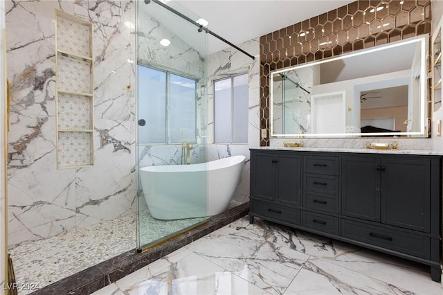 bathroom featuring vanity, lofted ceiling, plus walk in shower, ceiling fan, and tile walls