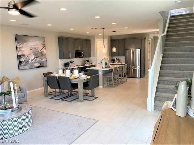 dining room with ceiling fan