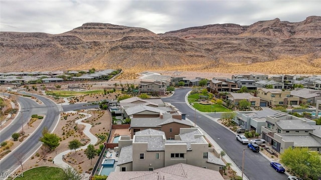 bird's eye view featuring a residential view and a mountain view