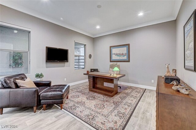 office space with hardwood / wood-style floors and ornamental molding