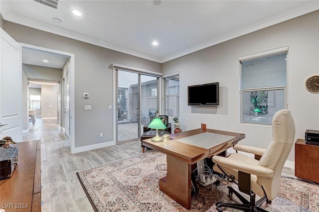 office area with visible vents, baseboards, crown molding, light wood-style floors, and recessed lighting