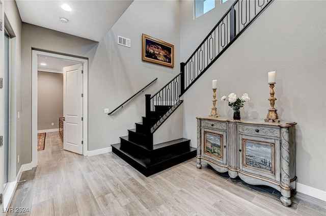 staircase featuring hardwood / wood-style floors