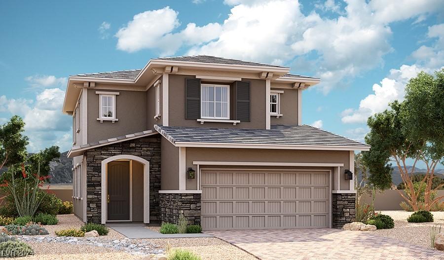 view of front of property with a garage