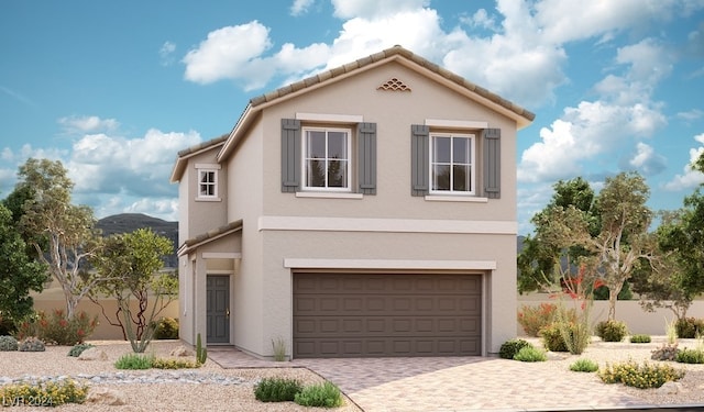 view of front of property featuring a garage