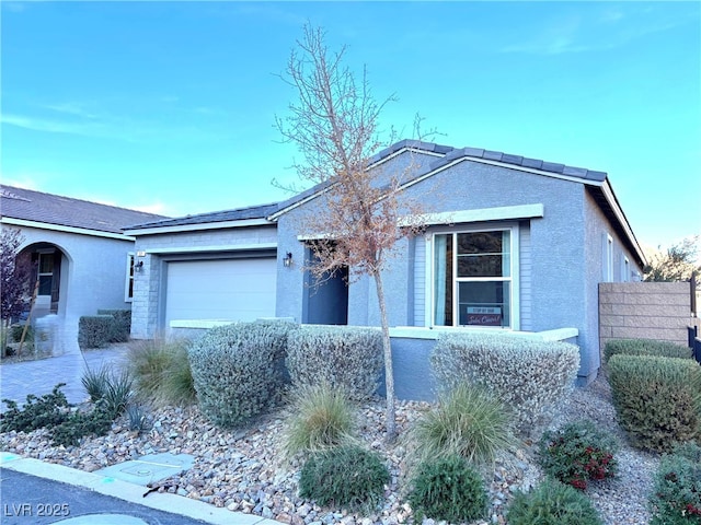 ranch-style house with a garage