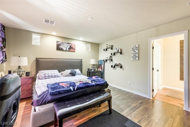 bedroom featuring hardwood / wood-style floors