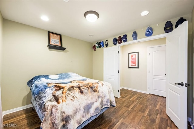 bedroom featuring dark wood-type flooring