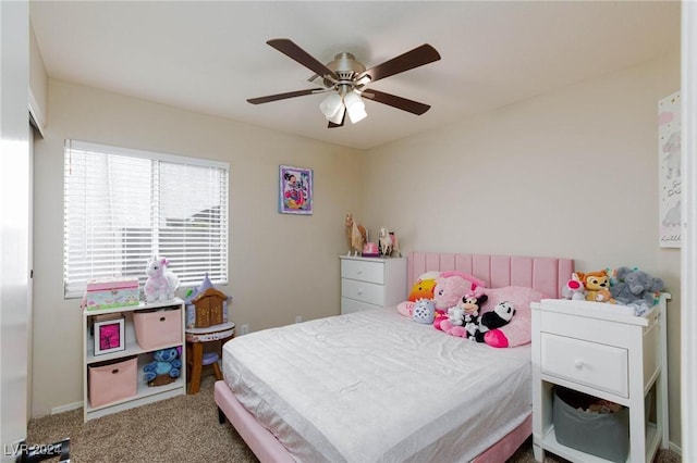 bedroom featuring ceiling fan and carpet floors