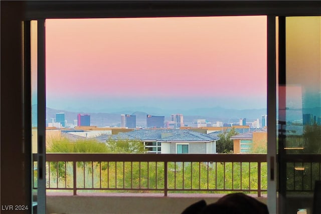 view of balcony at dusk