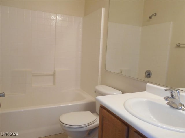 full bathroom with bathtub / shower combination, vanity, and toilet