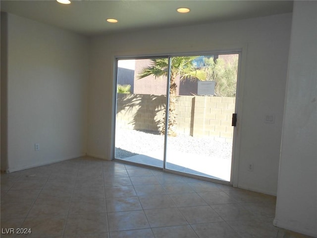 view of tiled spare room