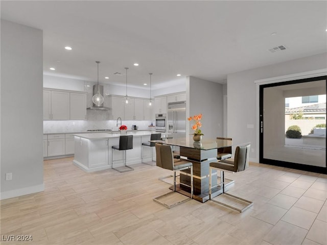 dining room featuring sink