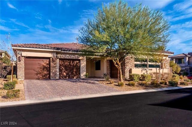 view of front of home featuring a garage