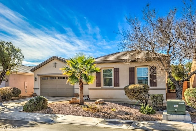 ranch-style home featuring a garage