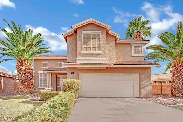 view of front of property with a garage