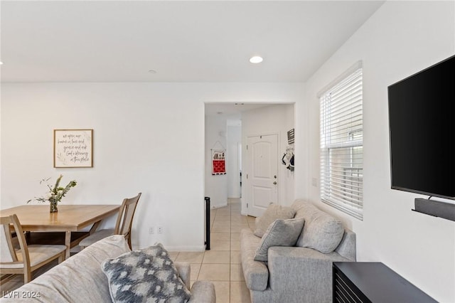 living room with light tile patterned floors