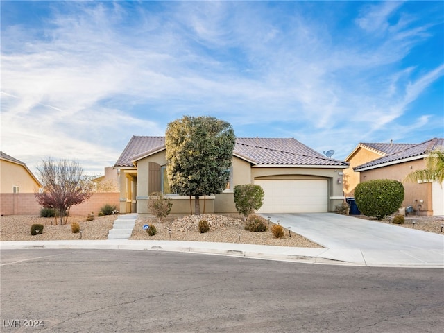 view of front of home with a garage