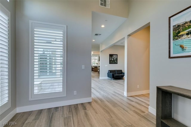 interior space with light wood-type flooring and plenty of natural light