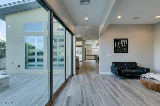 hall featuring light hardwood / wood-style floors