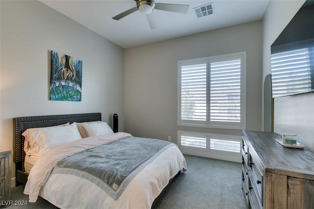 carpeted bedroom with ceiling fan