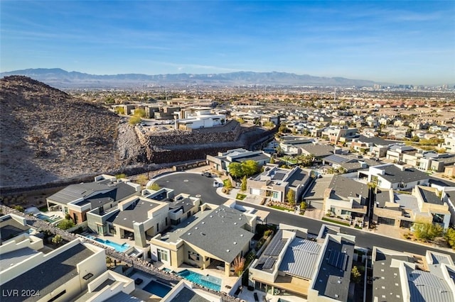 bird's eye view with a mountain view