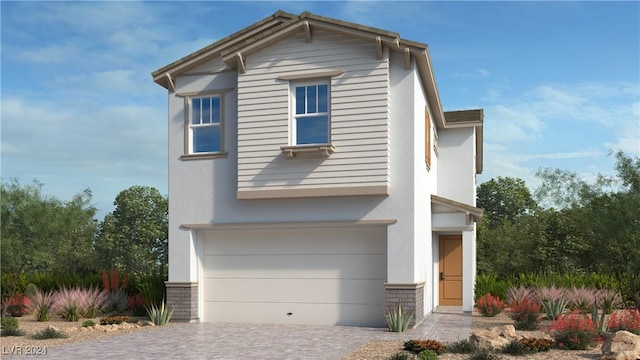 view of front of home with a garage