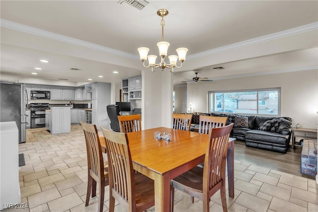 dining room featuring crown molding and ceiling fan with notable chandelier