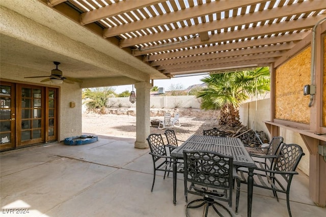 view of patio / terrace with a pergola and ceiling fan