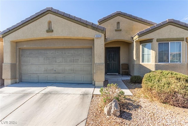 view of front of home featuring a garage