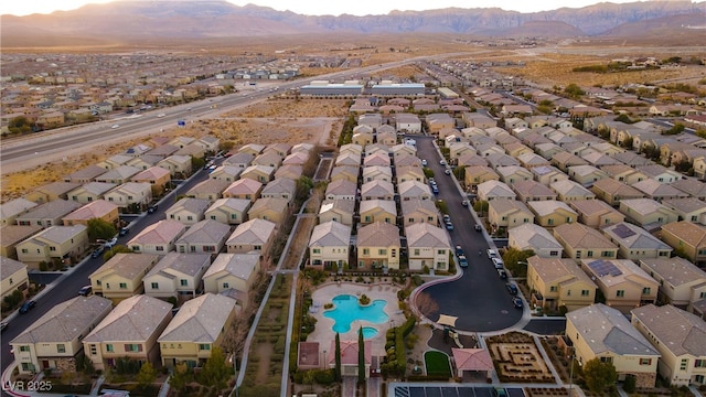 drone / aerial view with a mountain view and a residential view