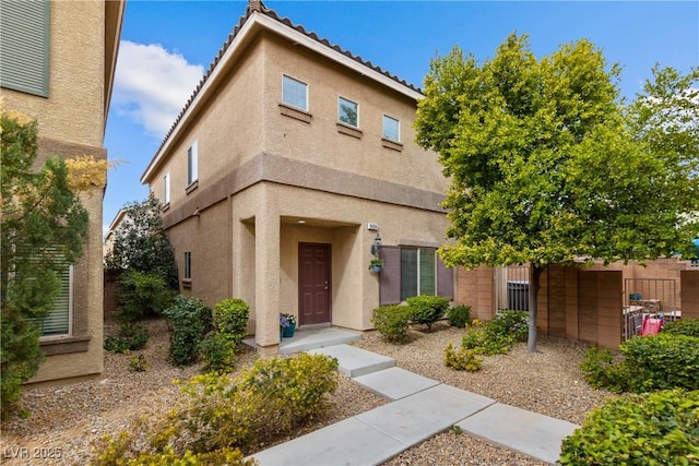 view of front of house featuring stucco siding