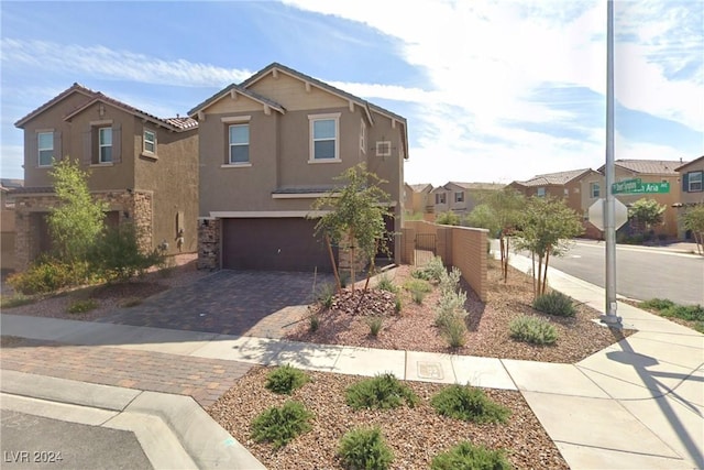 view of front of property with a garage