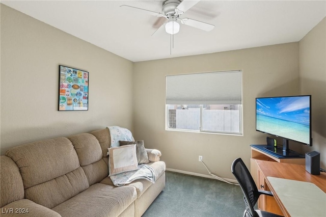 carpeted home office with ceiling fan