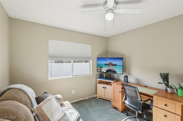 carpeted home office with ceiling fan