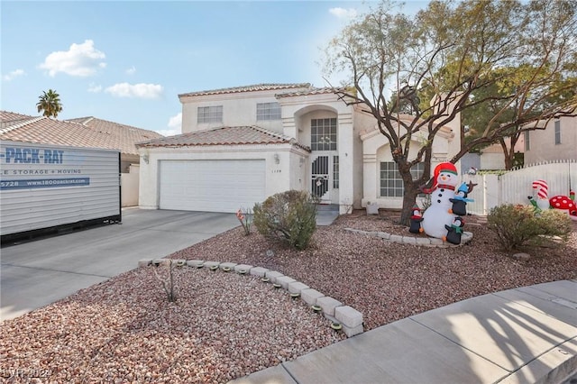 mediterranean / spanish-style home featuring a garage