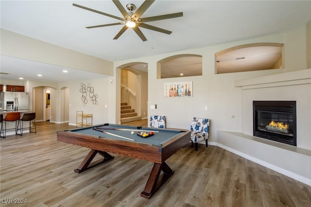 rec room with ceiling fan, hardwood / wood-style floors, and pool table