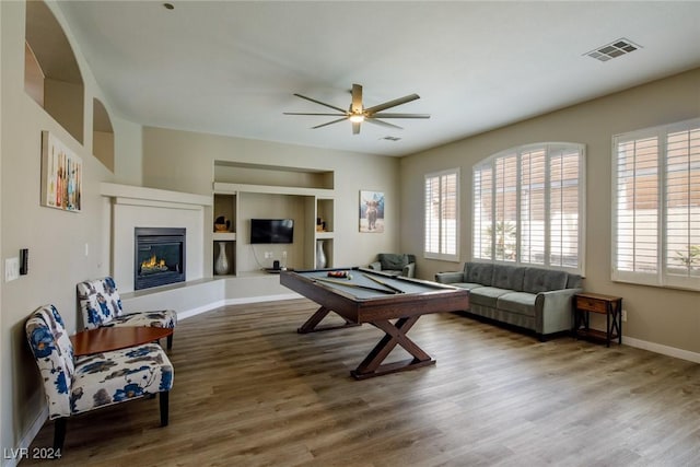 rec room with hardwood / wood-style floors, ceiling fan, and billiards