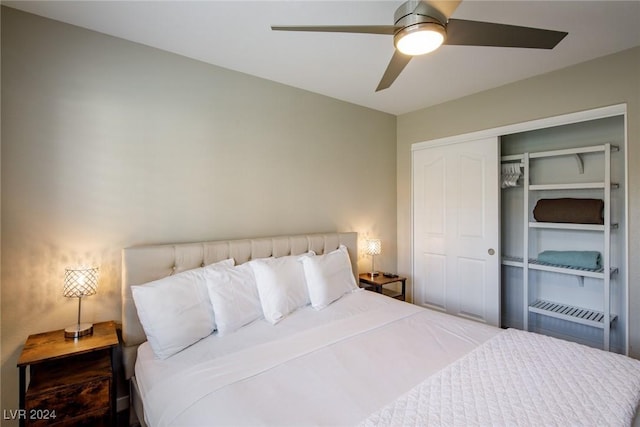 bedroom featuring ceiling fan and a closet