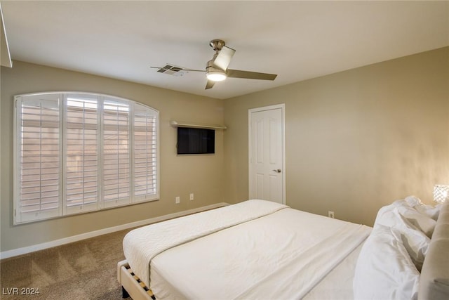 bedroom featuring ceiling fan and carpet floors