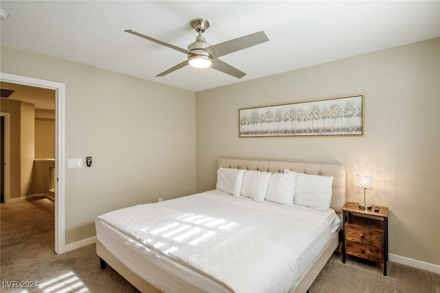 bedroom featuring light colored carpet and ceiling fan