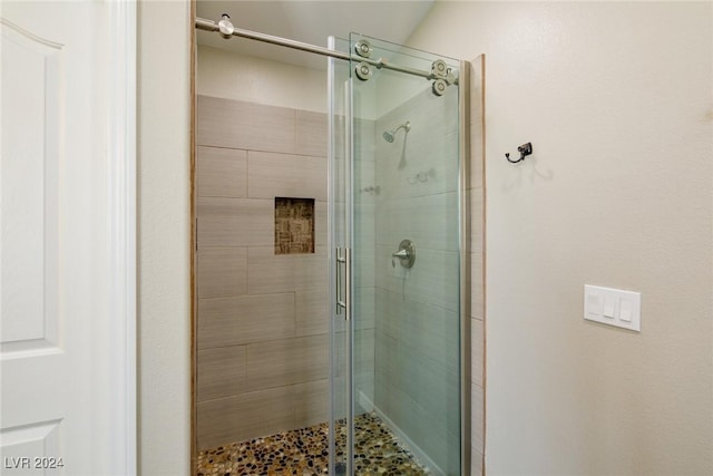 bathroom featuring walk in shower