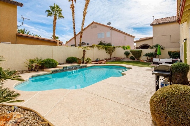 view of swimming pool with a patio