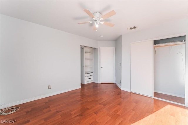 unfurnished bedroom featuring a closet, ceiling fan, and hardwood / wood-style floors