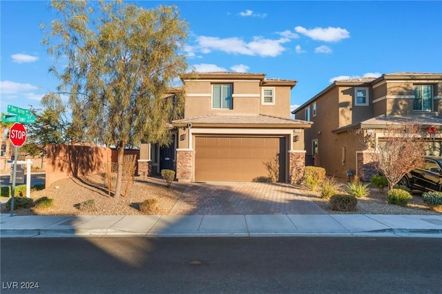 view of front of home with a garage