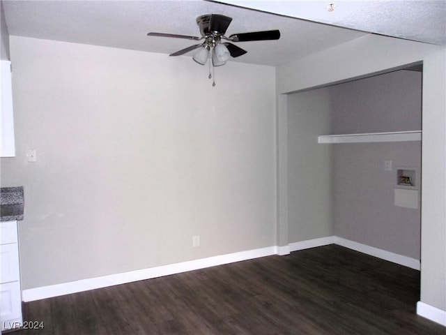 clothes washing area featuring ceiling fan, hookup for a washing machine, and dark wood-type flooring