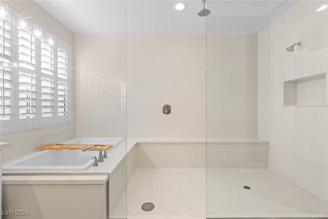 bathroom with independent shower and bath